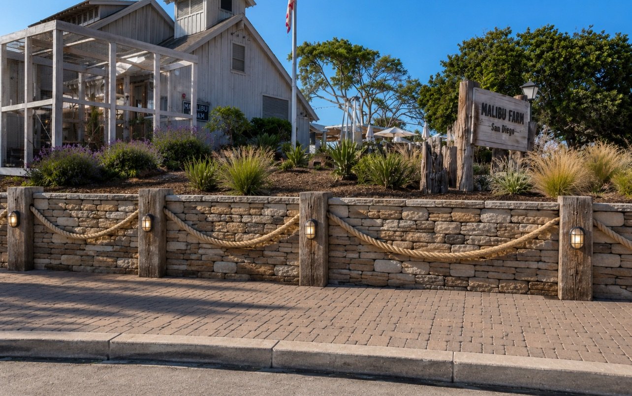 Legacy design proposal: stone retaining wall with rope rail and paver walkway